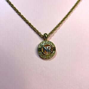 Nina Ricci Necklace 1/2in Pendant on a 14 in Adjustable length ChainGold tone